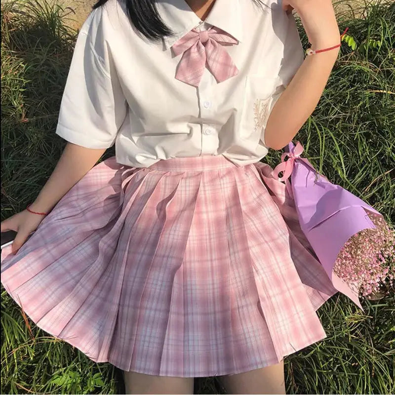 ZOKI pink plaid pleated mini skirt with waist bow, high-waisted Harajuku style