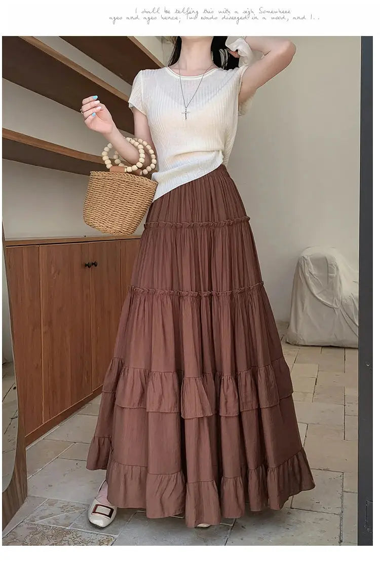 Tiered ruffle-hem maxi skirt, brown, high-waist, flowy layered chiffon.