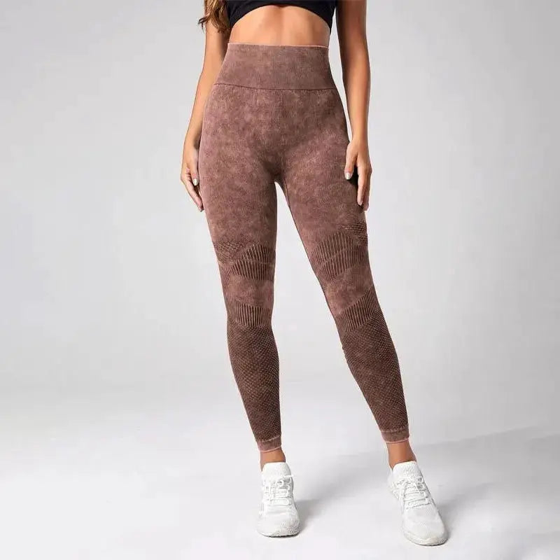 Ladies' high-waisted brown seamless yoga leggings with textured thigh panels for gym and running