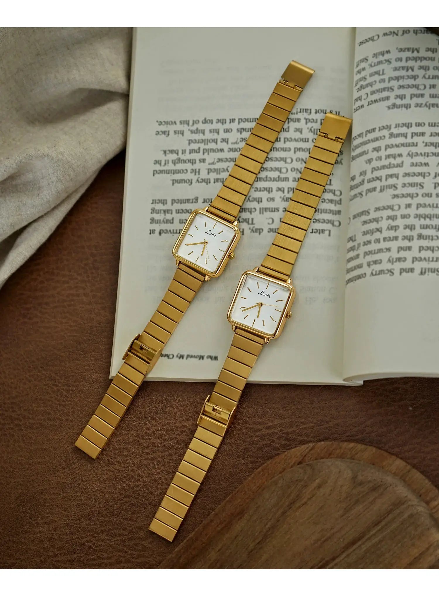 Two gold-toned women's square-dial quartz watches with stainless steel bands by Simples Market