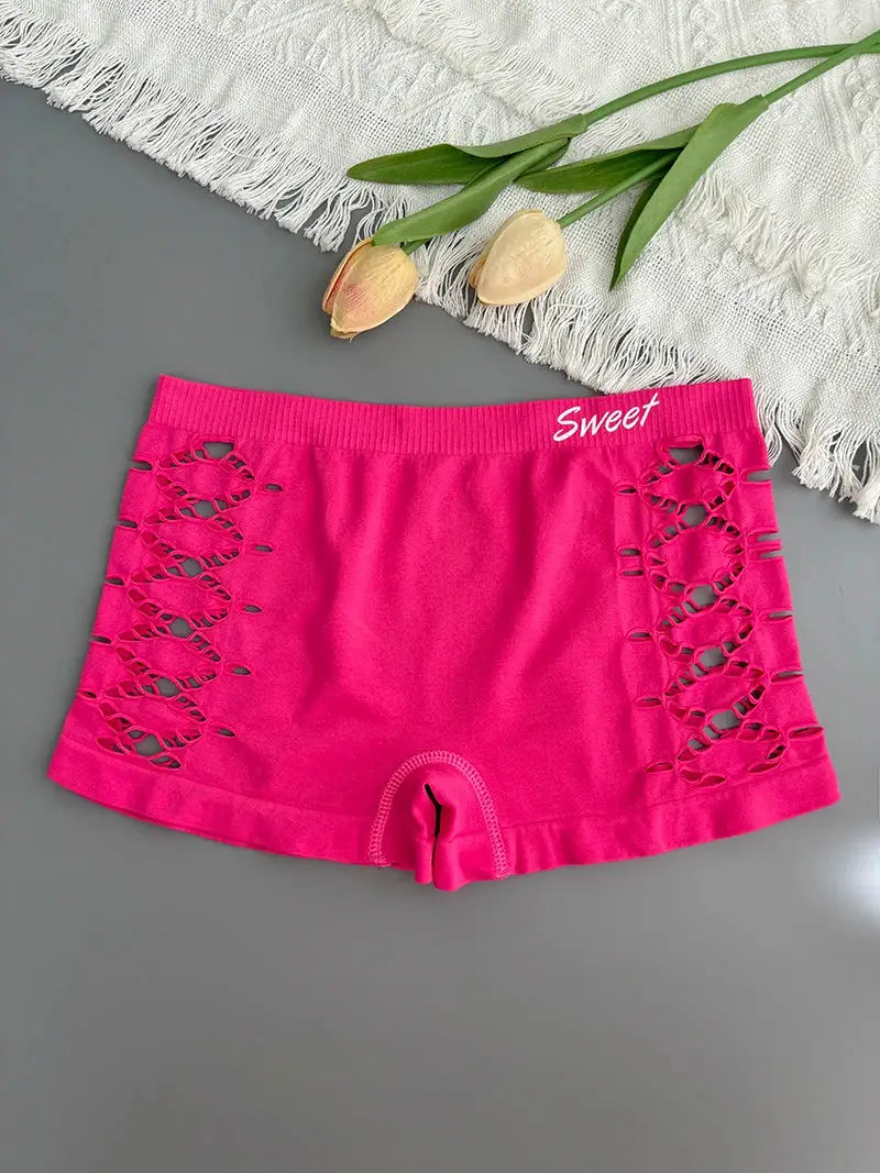 Seamless sports underwear shorts in pink with side hollow-out mesh panels and Sweet waistband.