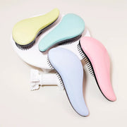 Antistatic massage brush set with pastel handles (yellow, mint, blue, pink) by Simples Market