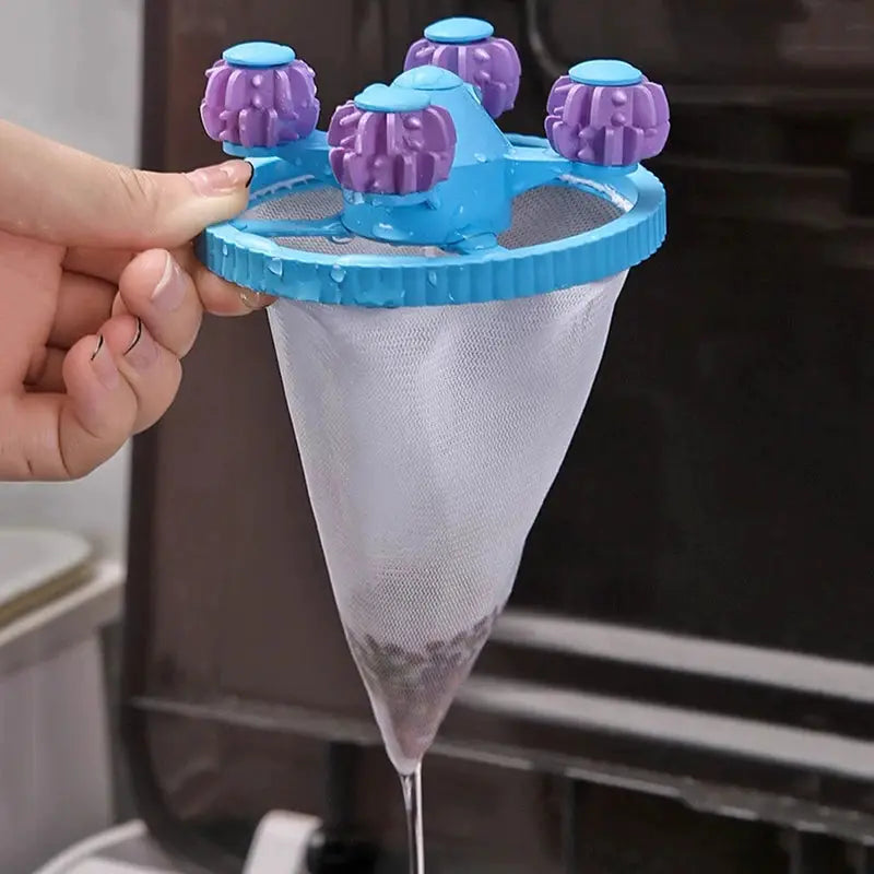 Simples Market washing machine filter bag with blue frame and purple knobs, reusable lint-catching net