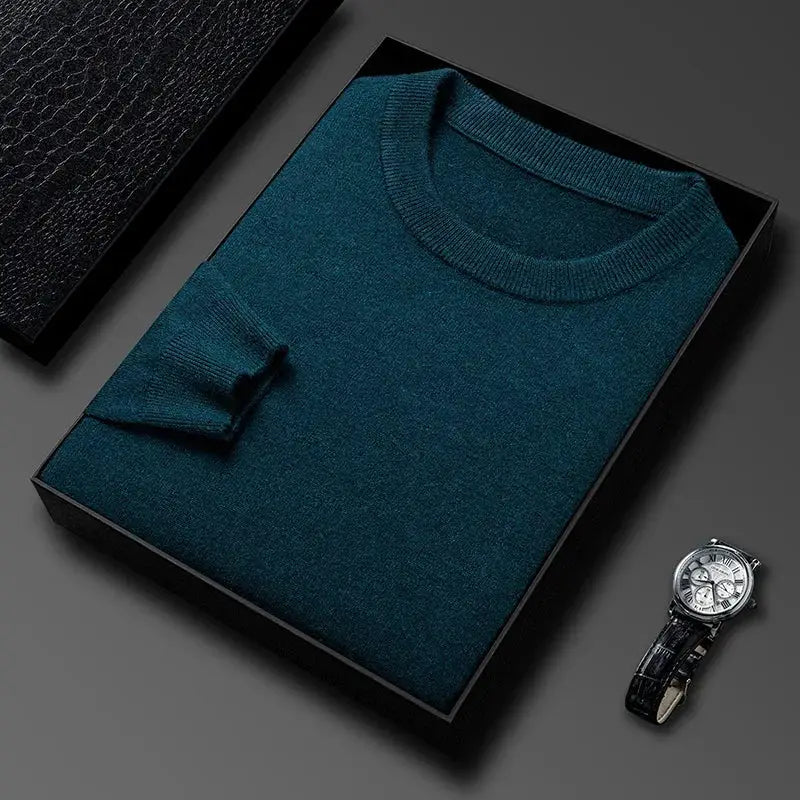 Men's teal knitted sweater in a black gift box beside a silver wristwatch