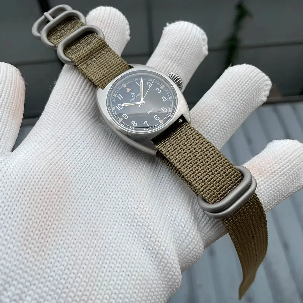 STEELFLIER SF745 wristwatch with 36mm stainless steel case and khaki fabric NATO strap, luminous dial