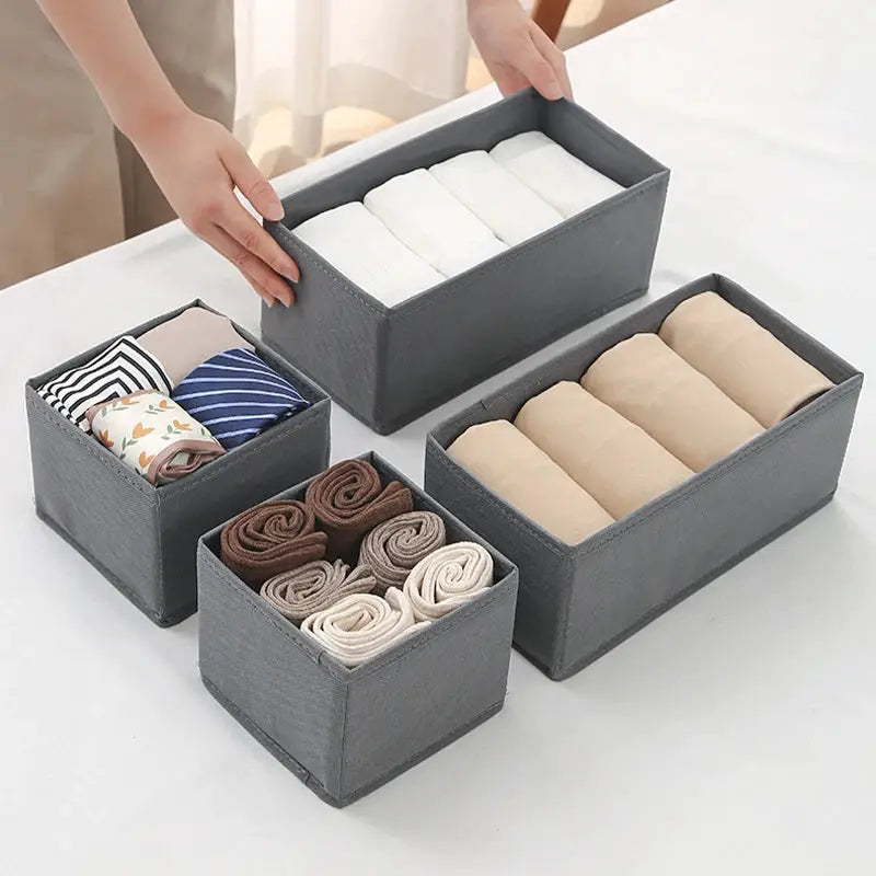 Fabric underwear storage box set in gray with five organizers for closet storage of socks, underwear, and towels.