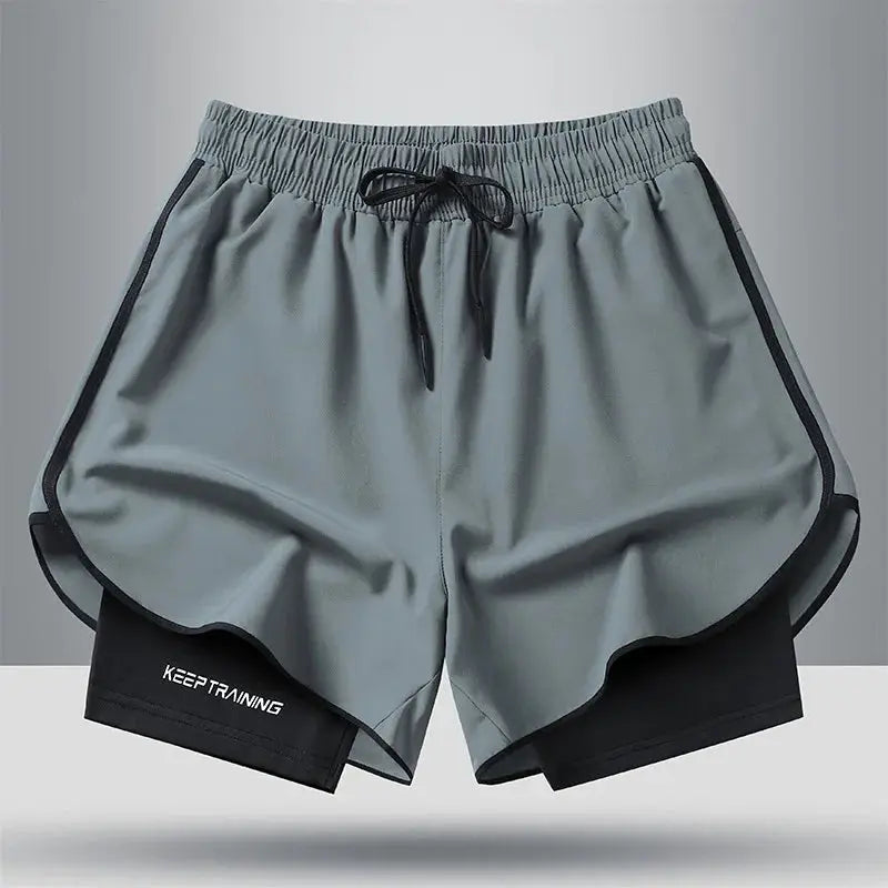 Men's quick-dry running shorts in gray with black inner liner and trim, drawstring waist, KEEP TRAINING logo.