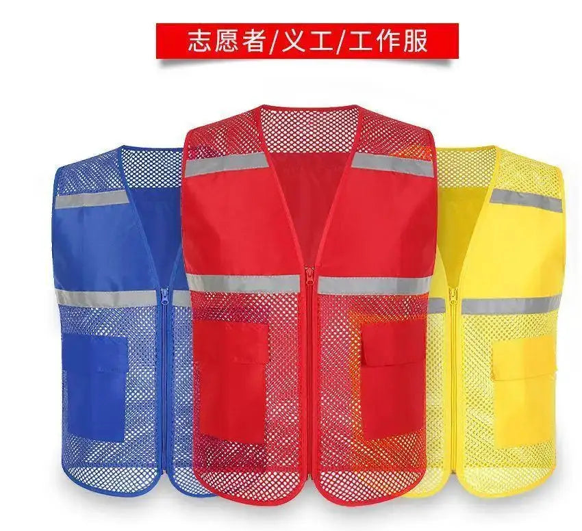 Three high-visibility volunteer fishing safety vests in blue, red, and yellow with reflective bands and mesh backs.