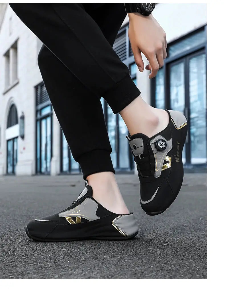 Pair of men's lightweight non-slip breathable running shoes, black with grey panels and gold detailing