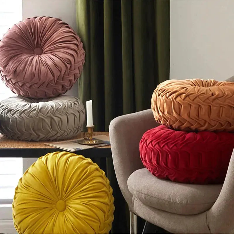 Five hand-sewn 3D pleated Dutch velvet throw pillows in pink, gray, yellow, orange, and red