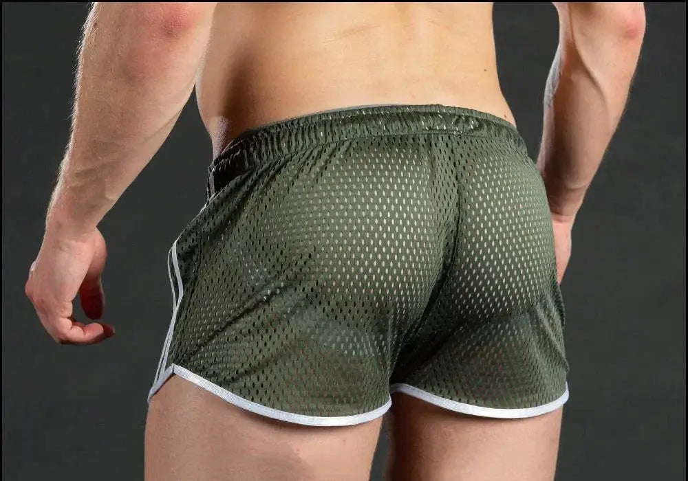Men's green grid-mesh running shorts with white trim, breathable quick-dry gym wear