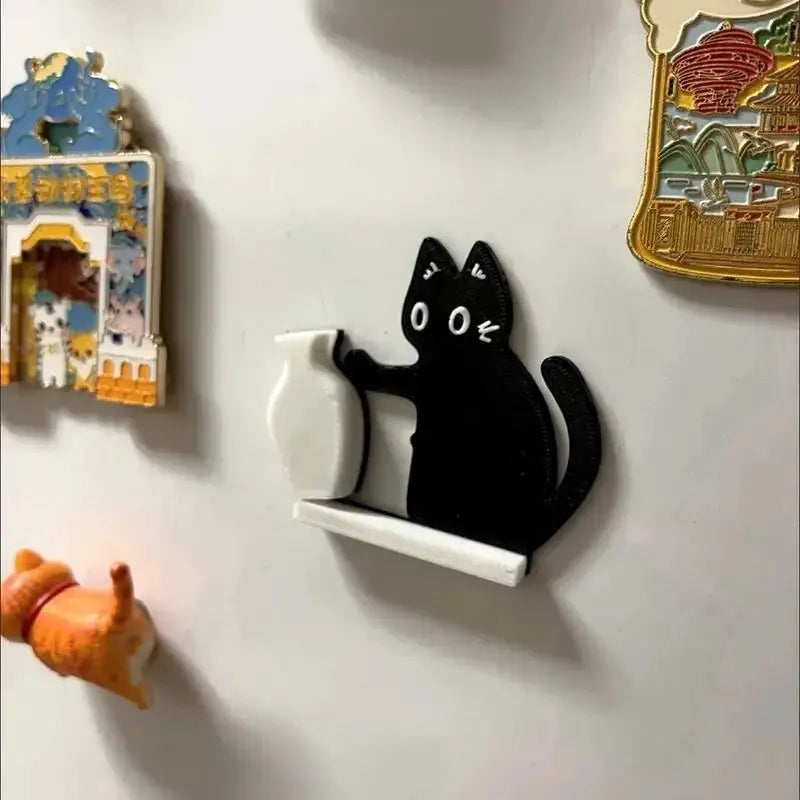 Fridge magnet featuring Simples Market black cat pushing a white vase, whimsical home decor