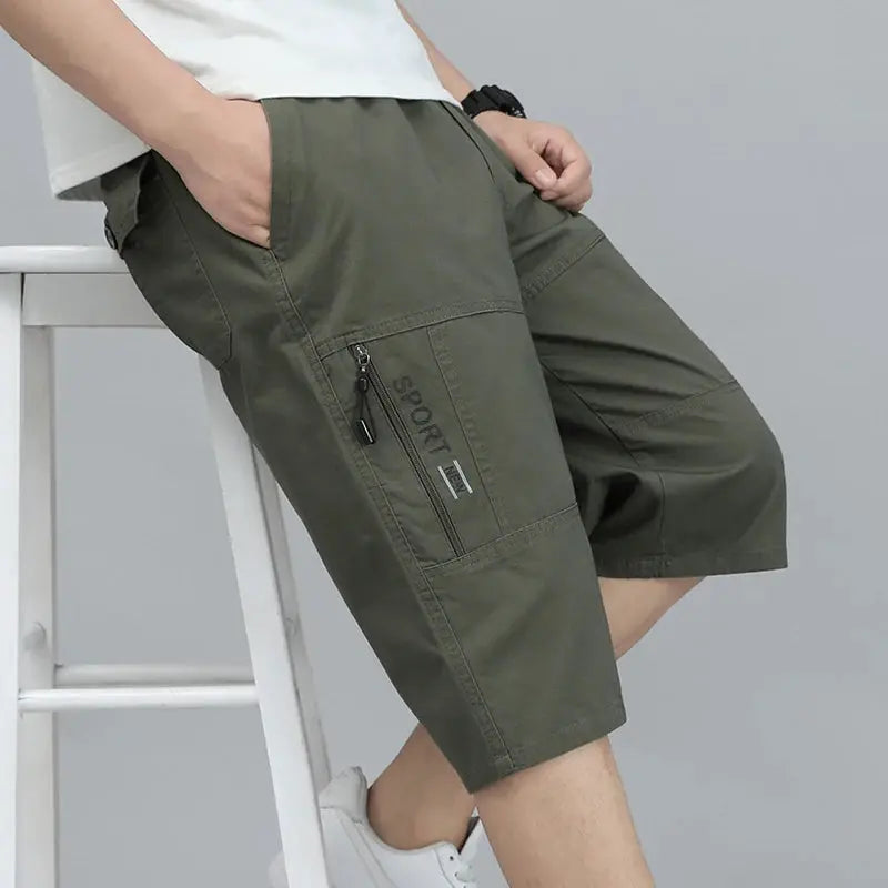 Mens cargo shorts knee-length olive green cotton with zip pocket and elastic waistband