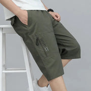 Mens olive green cargo shorts with zipper pocket, knee-length, cotton fabric, elastic waist