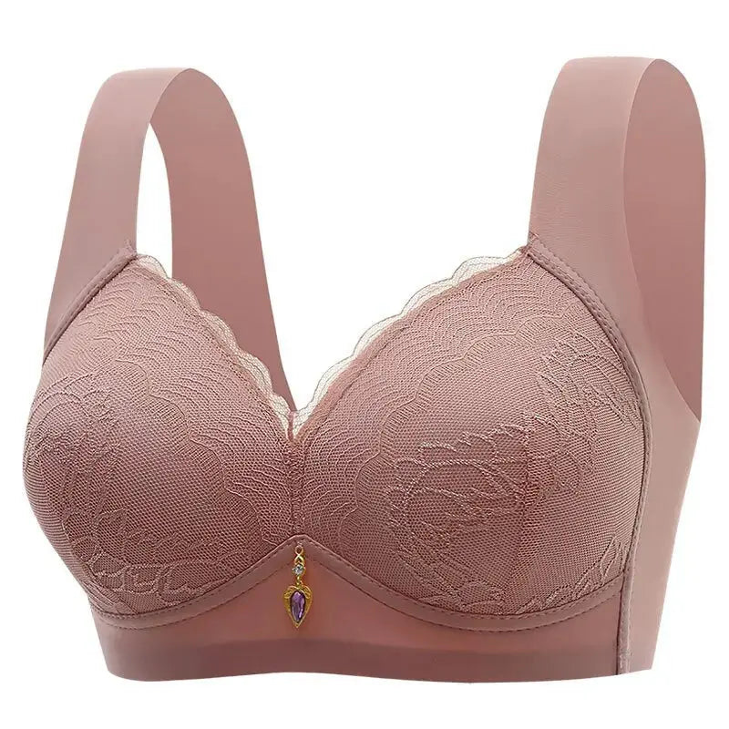 Pink lace non-underwire bra by Simples Market with wide straps and front jewel detail