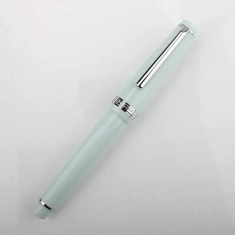 Jinhao 82 fountain pen, pale aqua acrylic with silver trim.