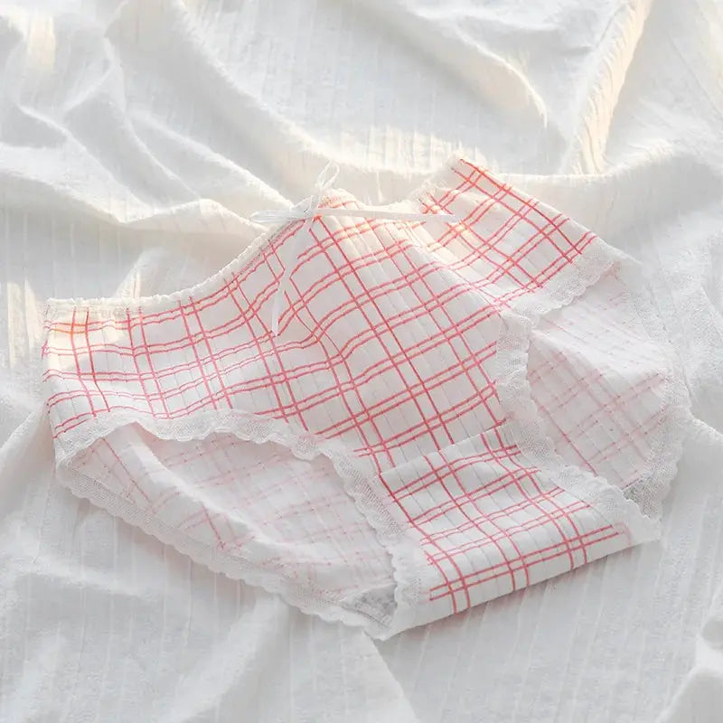 Women's cotton panties with pink plaid pattern, lace trim, and a small bow