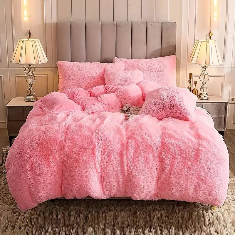 Pink plush 3-piece duvet cover set on a bed with fluffy comforter and matching pillows
