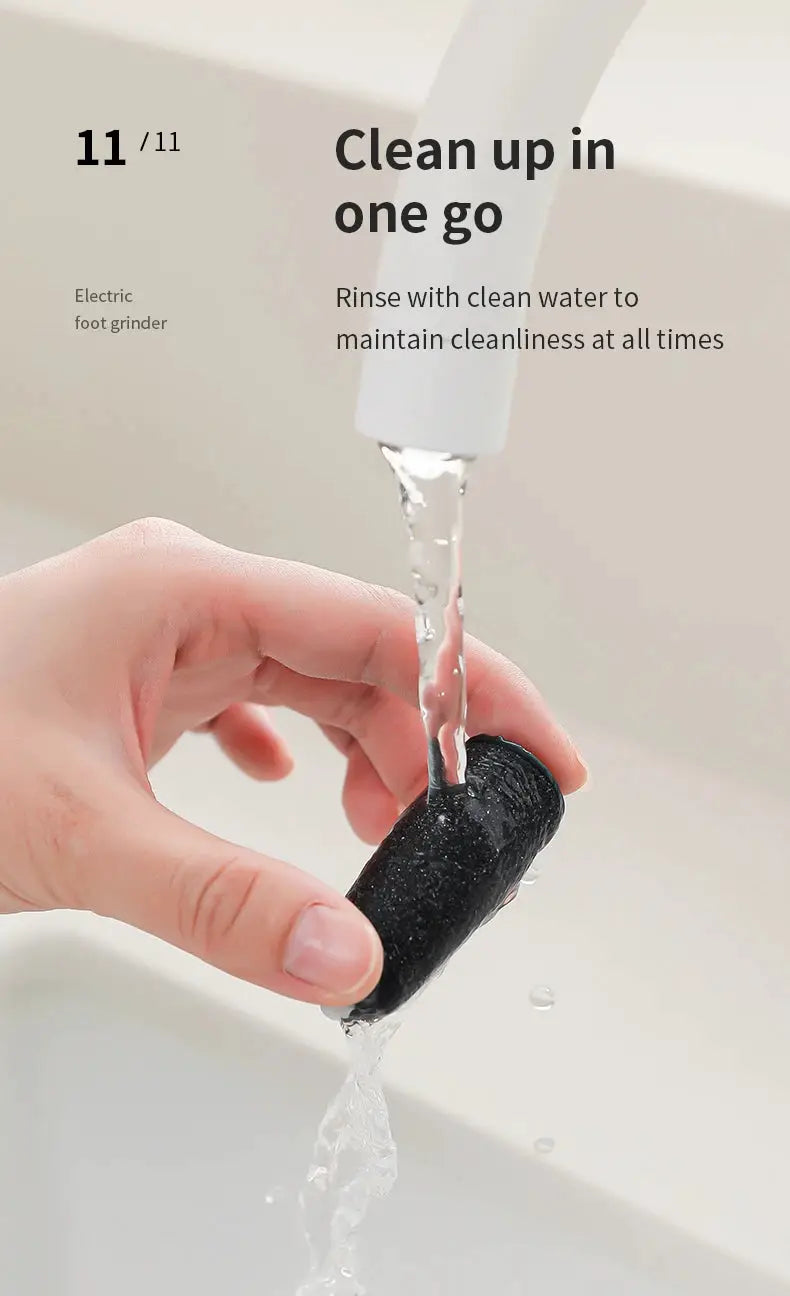HOMEFISH electric foot grinder roller, black textured head, being rinsed under running water