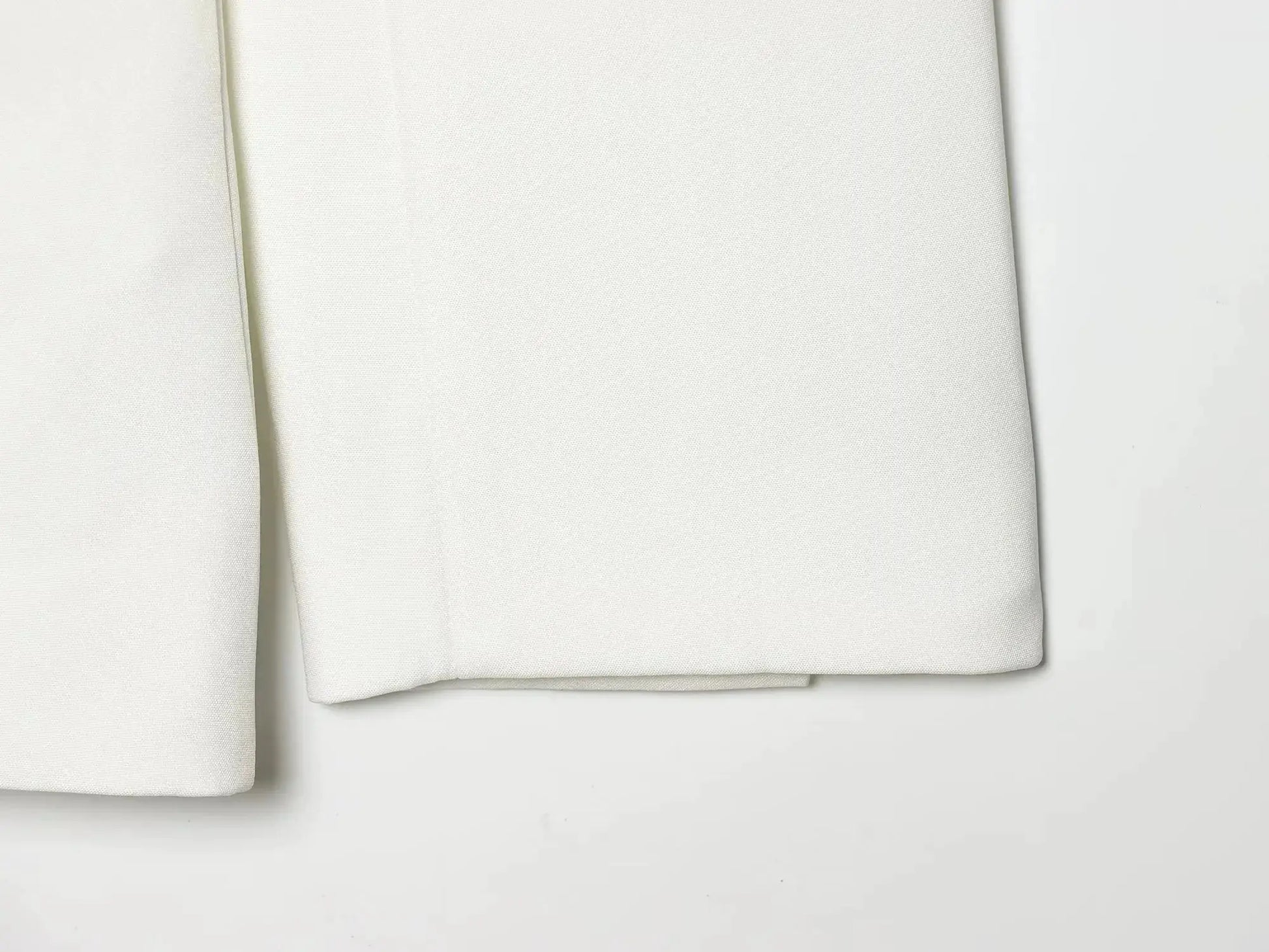 KONDALA white blazer suit fabric close-up; textured office wear fabric