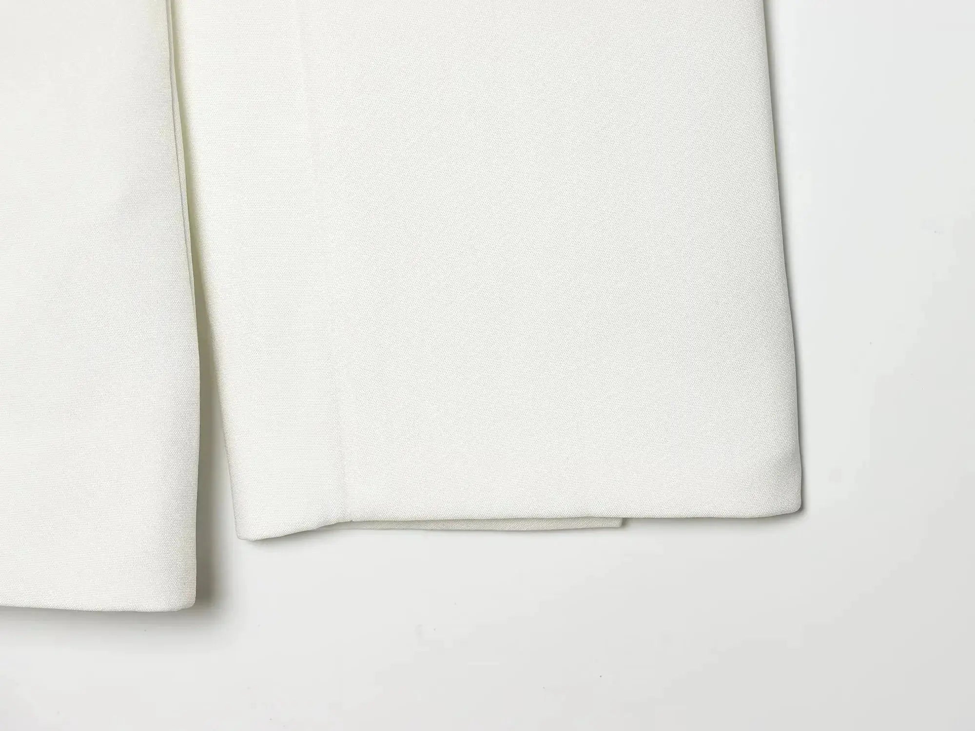 KONDALA white blazer suit fabric close-up; textured office wear fabric