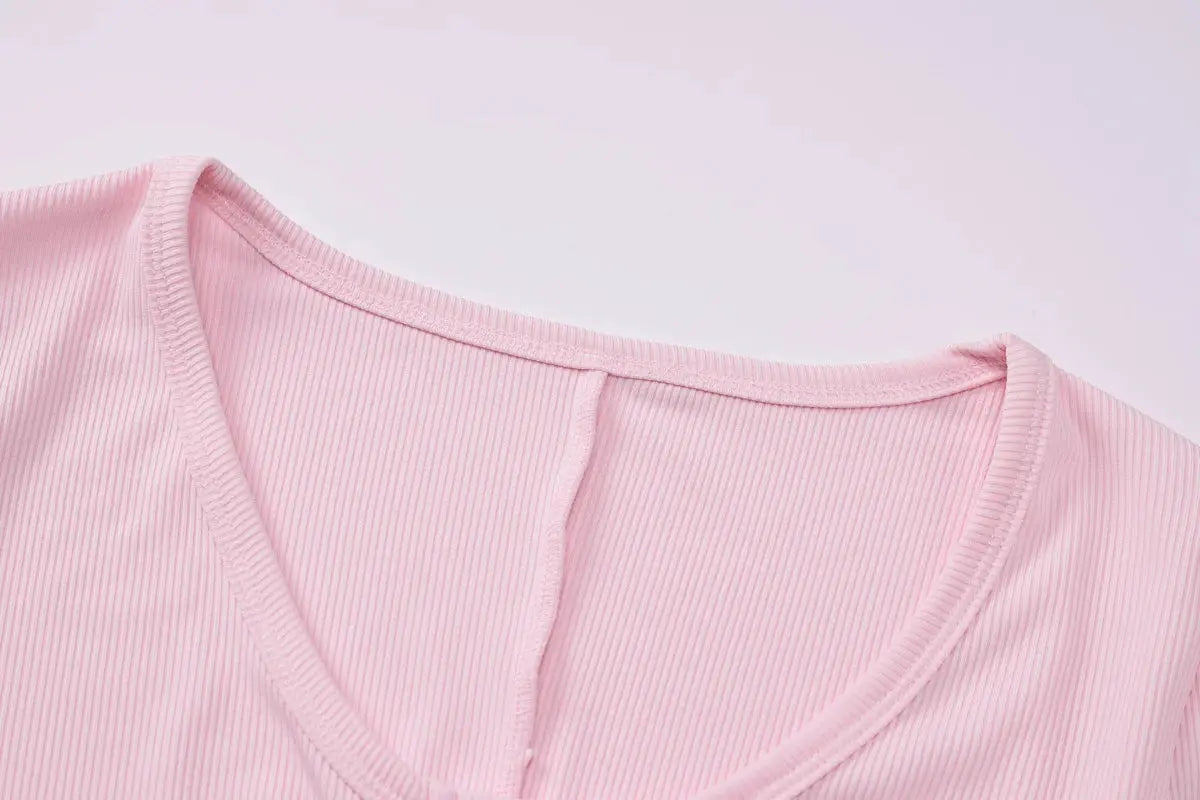 Hugcitar pink ribbed square-collar long-sleeve playsuit neckline close-up