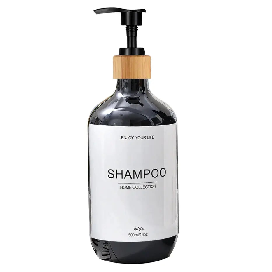 Shampoo dispenser bottle with pump; dark glass bottle with bamboo collar and white SHAMPOO label, 500ml.