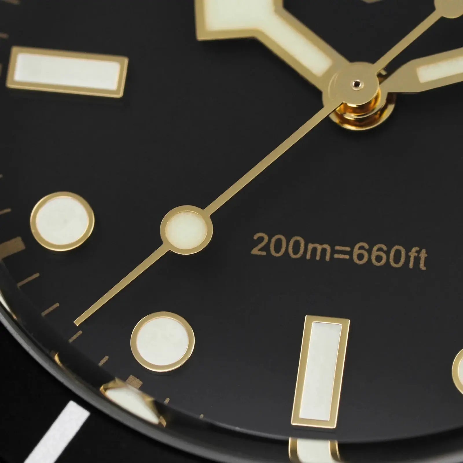 Watchdives WD7922 BB54 watch dial close-up with gold hands, luminous markers, black dial, 200m rating.
