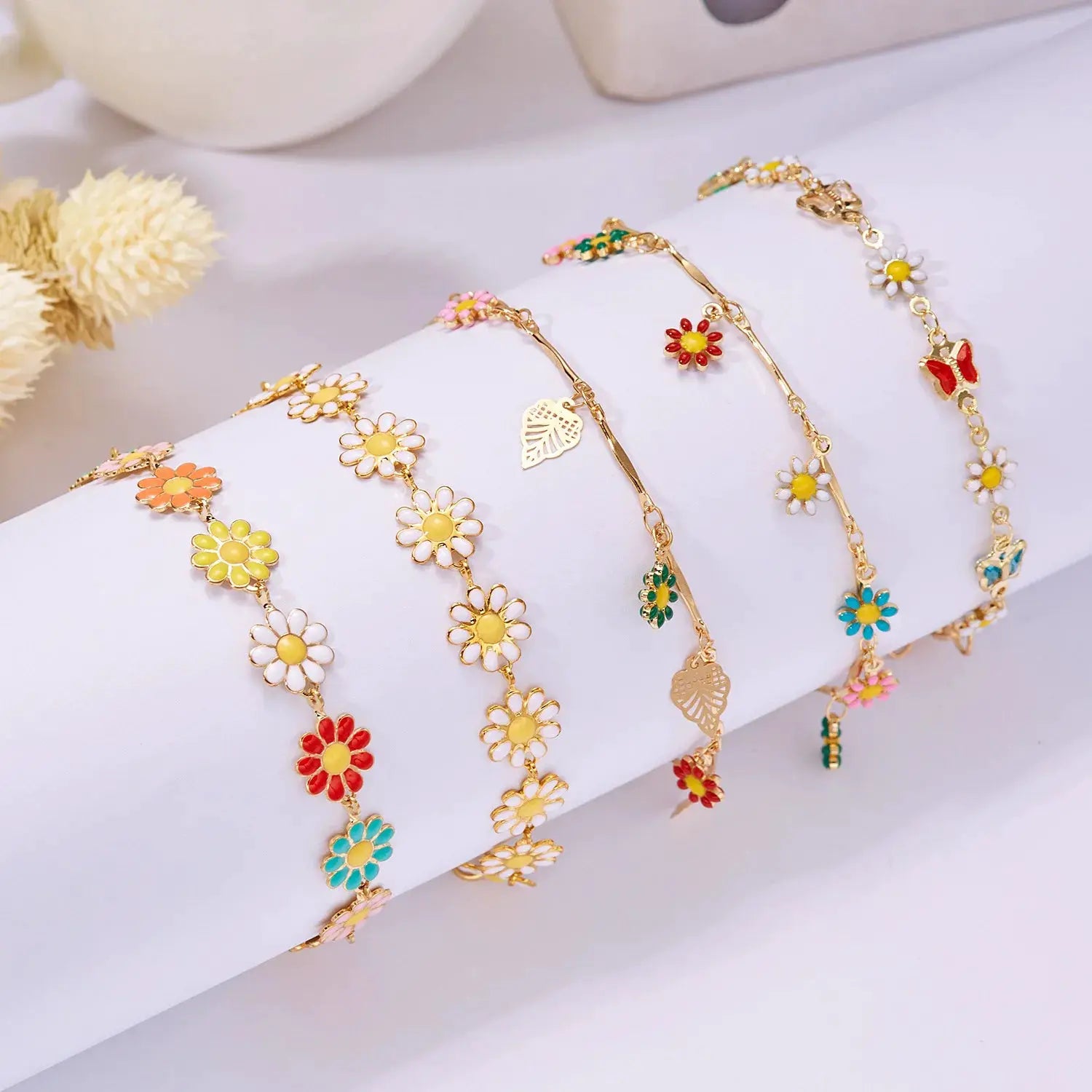 Sweet Daisy flower bracelet set with gold-tone chains and colorful enamel daisies for women