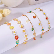 Sweet Daisy flower bracelet set with gold-tone chains and colorful enamel daisies for women