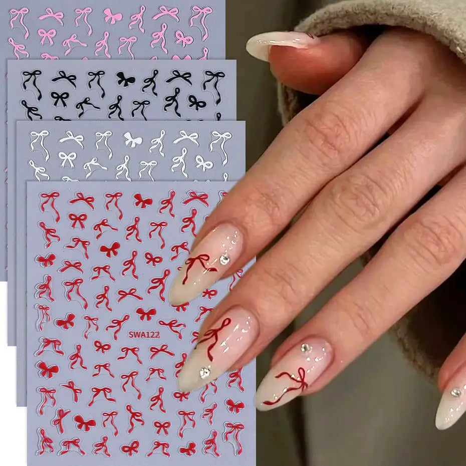 Simples Market bowknot nail stickers set; 4 stacked sheets of pink/black/white/red bows for French-tip nails.