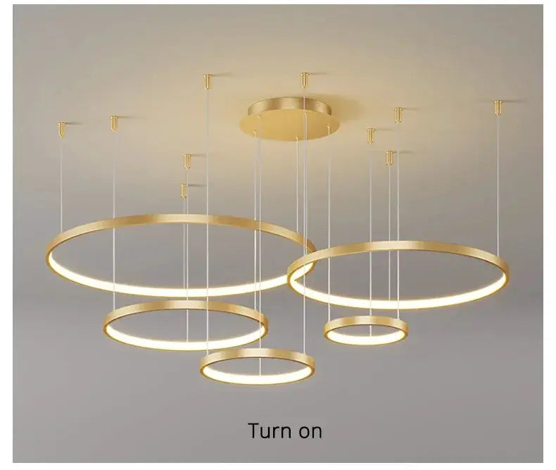 Gold multi-ring pendant lights with circular LED rings, modern minimalist chandelier for living room