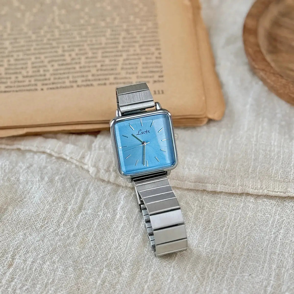 Women's stainless steel watch with blue square dial and silver band by Simples Market