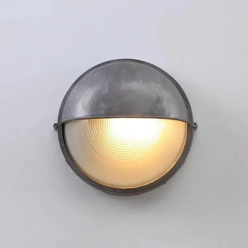 Outdoor retro LED wall lamp, round metal fixture with glass lens, IP65 waterproof, industrial vintage style