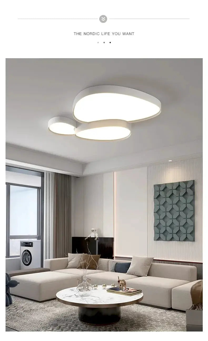 Modern LED ceiling lamp with three overlapping white discs, remote-controlled, for living or dining rooms.