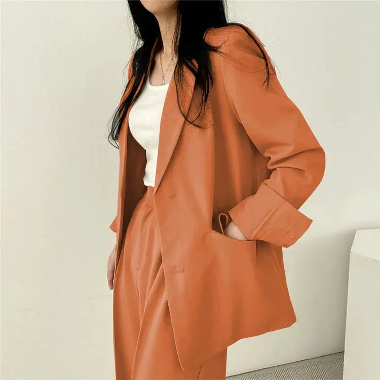 Two-piece rust-orange blazer and pants set for women by Simples Market