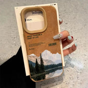 iPhone case with faux leather border and mountain lake scenery print