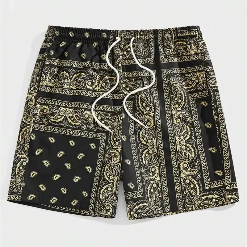 Men's trend bandana graphic beach shorts; black with beige paisley bandana print and white drawstring.