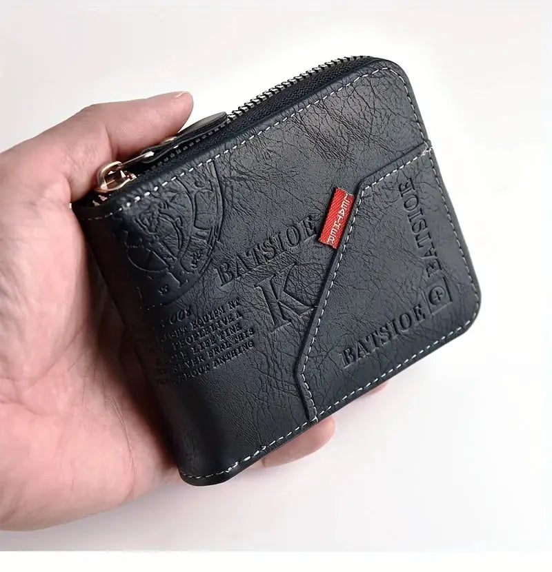 Men's black PU wax oil skin wallet with zip-around closure, coin pocket, and diagonal stitched front panel