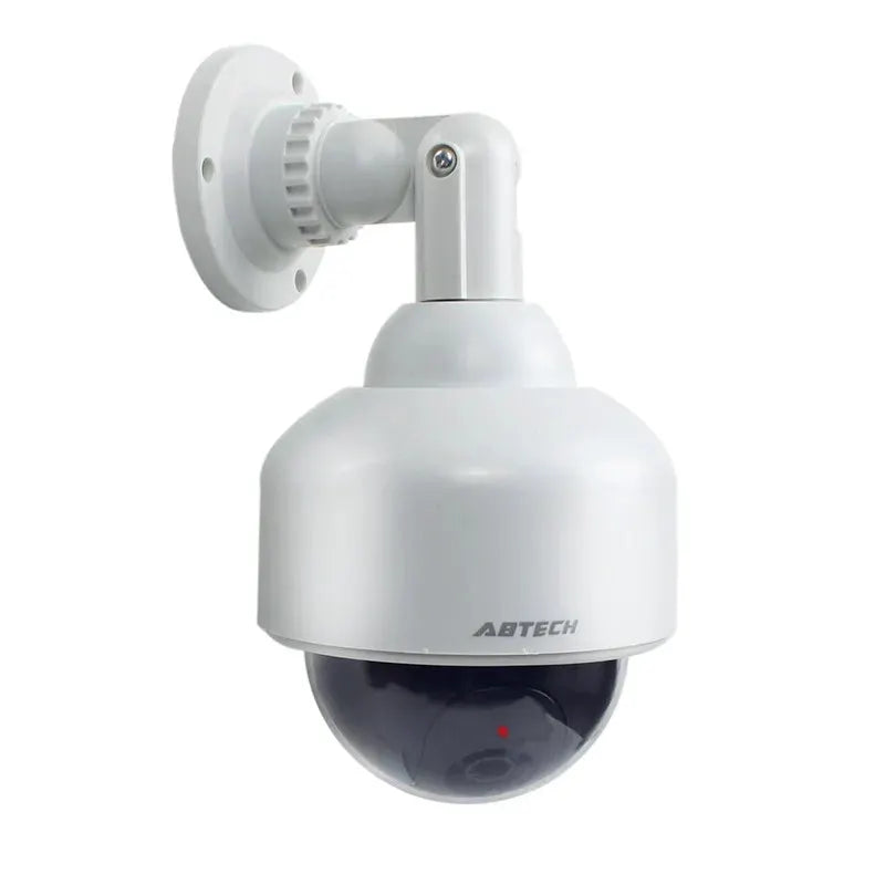 Dummy security camera on white wall-mount, ABTECH branded outdoor dome with tinted lens.