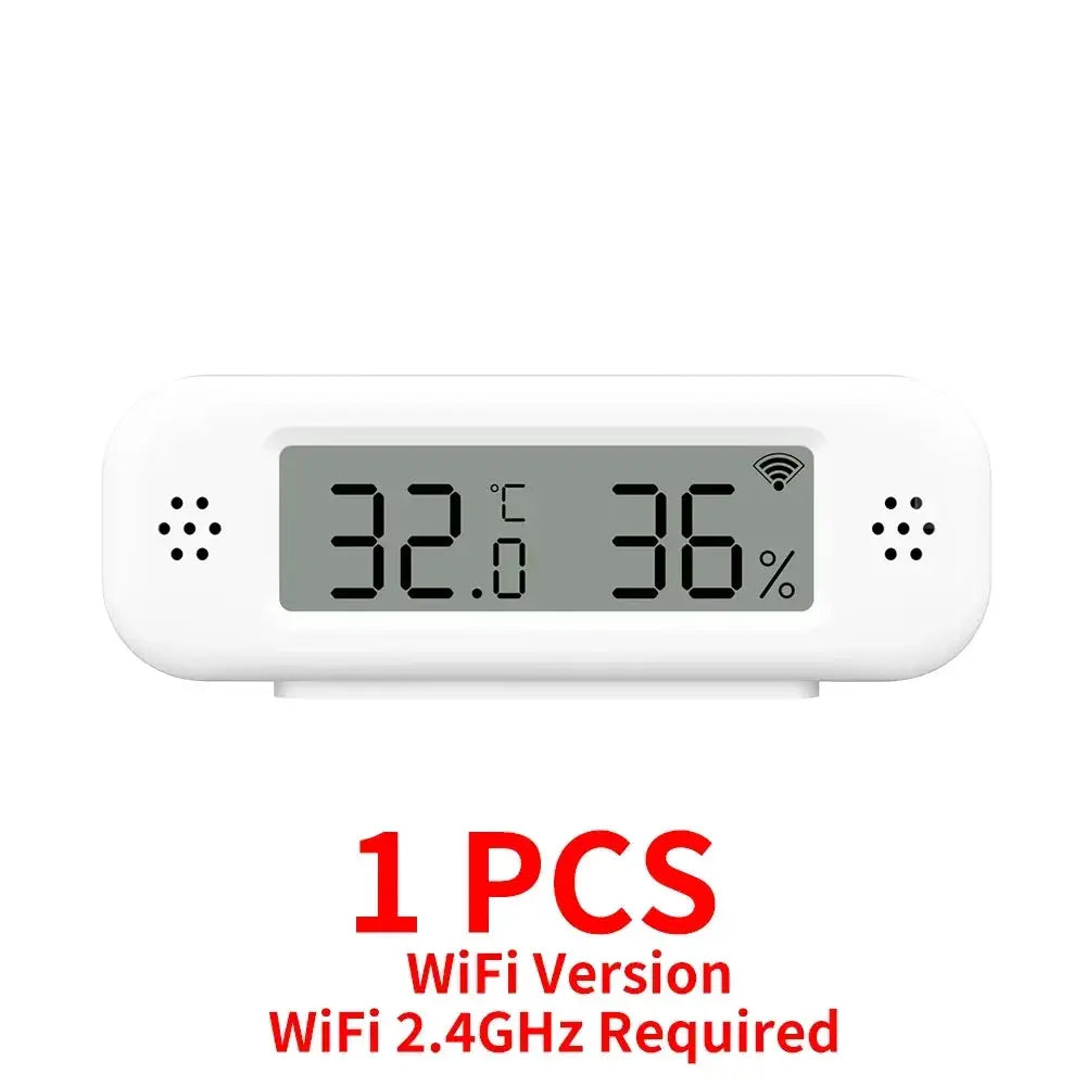 Tuya WiFi temperature humidity sensor, white smart thermometer with 32°C and 36% humidity on display.