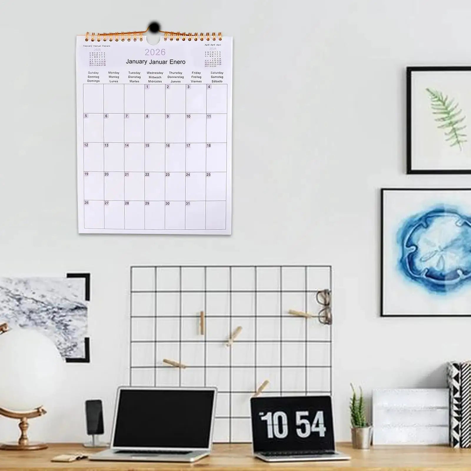 Simples Market 2026 multilingual wall calendar, 12-month coil planner, white with monthly grid