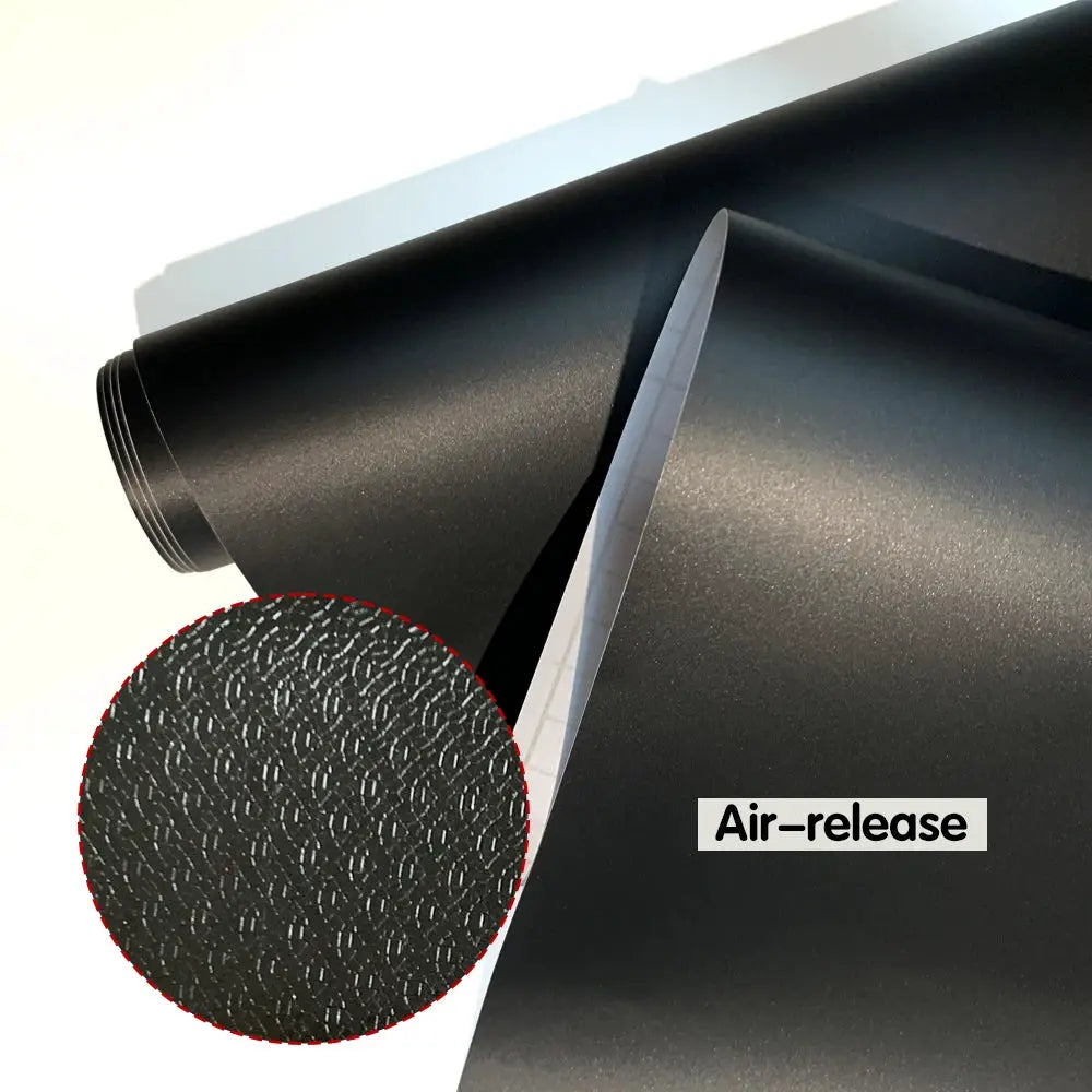 Simples Market PVC car vinyl wrap roll, matte black finish with air-release texture.
