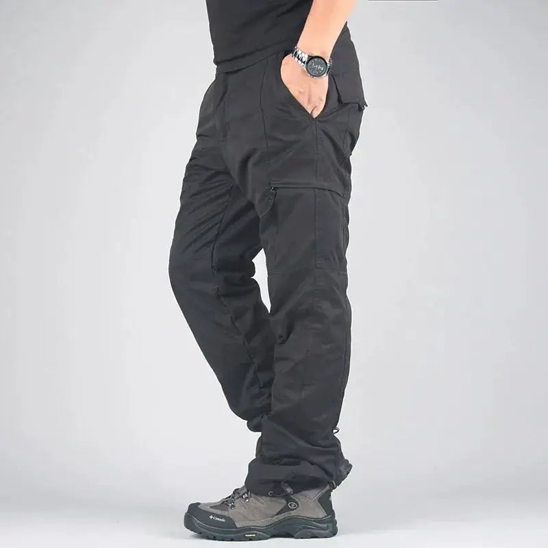 Men's black fleece cargo pants with multiple pockets for hiking and warm thermal joggers