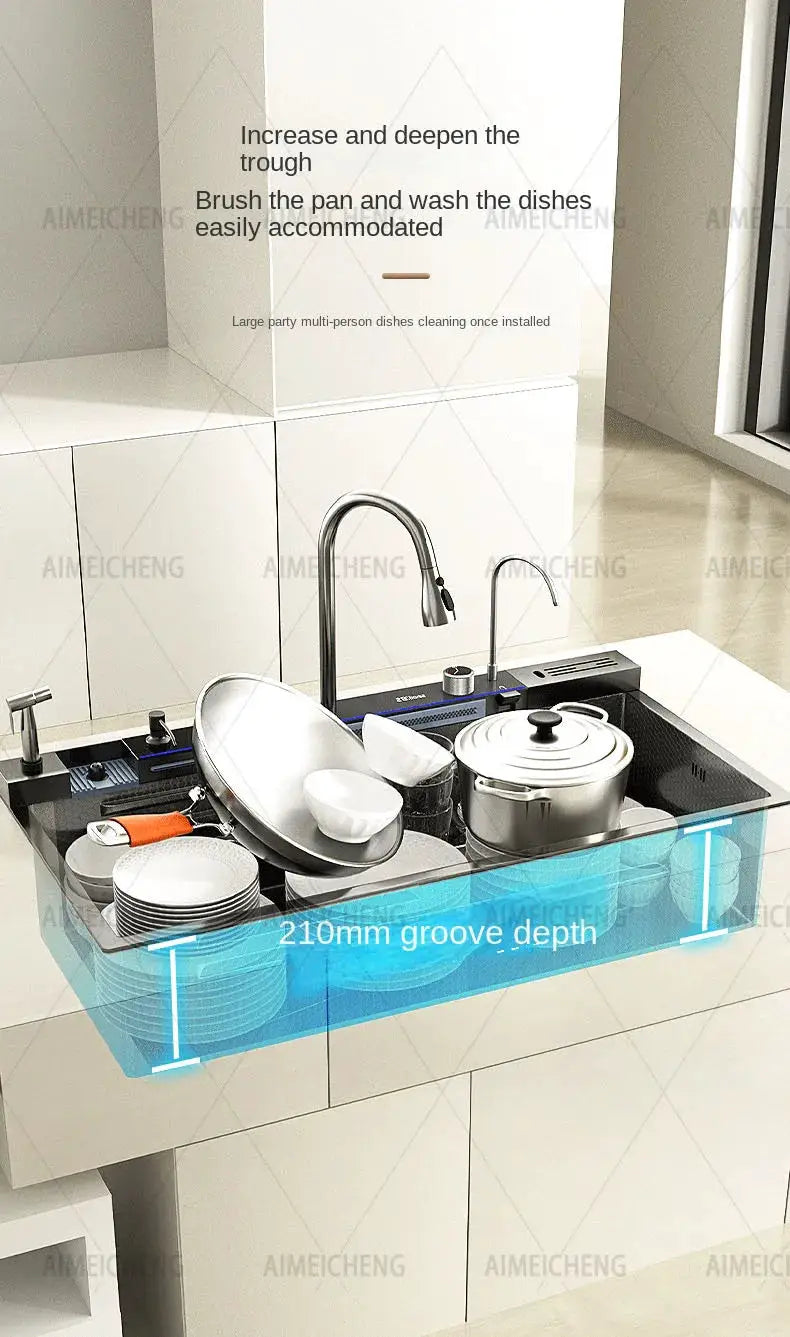 Stainless steel kitchen sink with waterfall faucet, large single basin and left-side drainage.