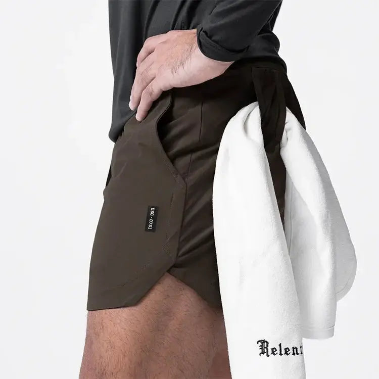 ASRV men's quick-dry basketball shorts in brown with side pocket, white towel hanging from waistband