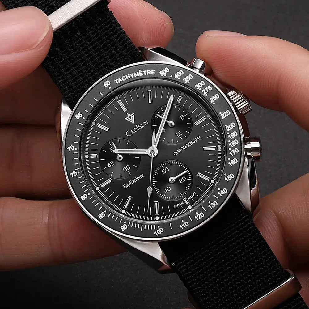 CADISEN men's luxury quartz chronograph watch with black dial, tachymeter bezel, stainless steel case and canvas strap