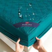 Teal waterproof fitted mattress protector with deep pocket for single or double bed.