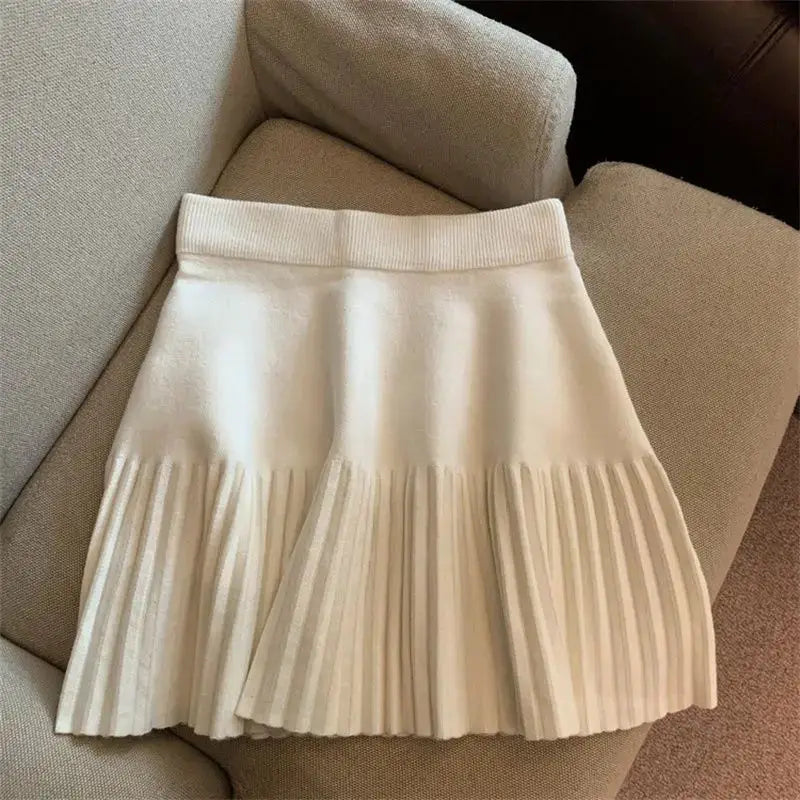 Korean Flair Pleated Mini Skirts With Knitted Design And Elastic Waist For Casual Youthful Wear