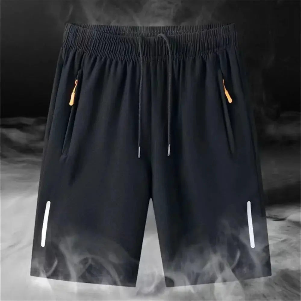 Men's black Simples Market quick-dry shorts with drawstring waist, orange zipper pulls, zip pockets, and white reflective side stripes